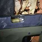 image for "One in a billion shot." Cop's bullet fired exactly down the barrel of mugger's gun, jamming it.