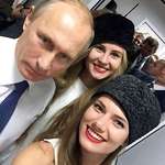 image for Vladimir Putin takes selfie with two girls