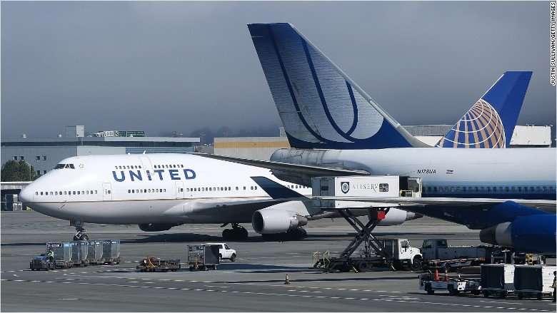 image for United Airlines shares drop after man dragged off flight