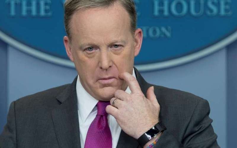 image for Facing calls to resign, Spicer apologizes for 'inappropriate' Hitler-Assad comments