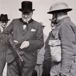 image for Winston Churchill holding a Thompson Submachine Gun and smoking a cigar- 1940