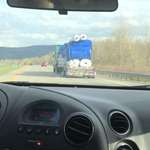 image for This truck carrying rolls of plastic looks like Cookie Monster