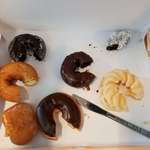 image for THIS IS DONUT ANARCHY: My friend's co-worker cut a piece out of every donut in the box.