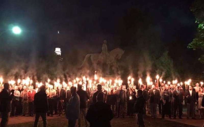 image for Protestors chant Nazi phrases, wield torches near Confederate statue in Charlottesville, Va.