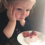 image for Wife took a perfectly timed picture of our daughter contemplating life while eating strawberries.