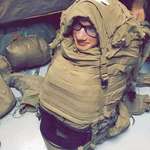 image for PsBattle: U.S. Marine stuffed into backpack.