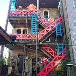 image for Boystown Chicago's arcade bar (Replay) just put up these awesome new Donkey Kong / Mario decorations on their porch!