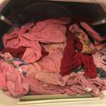 image for My husband attempted to help with the laundry. I don't buy pink towels because I don't like pink.