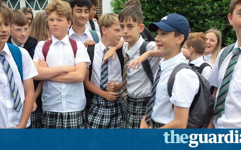 image for Teenage boys wear skirts to school to protest against 'no shorts' policy