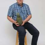 image for My dad has been trying to grow pineapples for the last year, today he succeeded, look how proud he is.