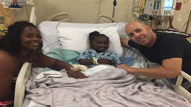 image for Hero reunites with little girl he saved from drowning on her birthday
