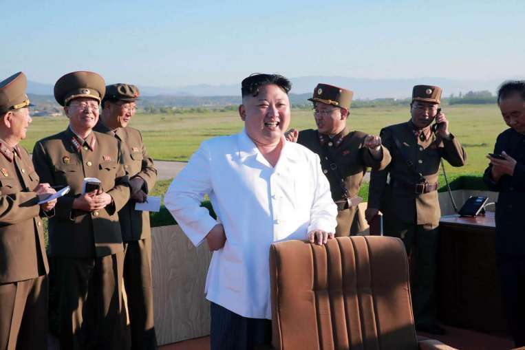 image for North Korea's Kim Jong Un says ICBM an Independence Day 'gift' to 'American b**tards': KCNA