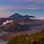image for I won my way through the selfie sticks - Panoramic View of Gunung Bromo at Dawn in Indonesia [OC] [8498 x 3732]