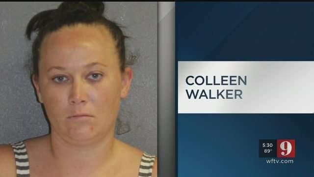 image for Police: Mom says it's 'too hot' in squad car after arrest for allegedly leaving child in hot car