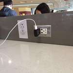 image for I watched at least 3 people try to plug in their phones to this "outlet" at the Seattle Airport.