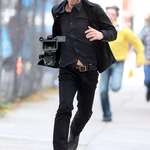 image for PsBattle: Keanu Reeves running after stealing the camera of a paparazzi