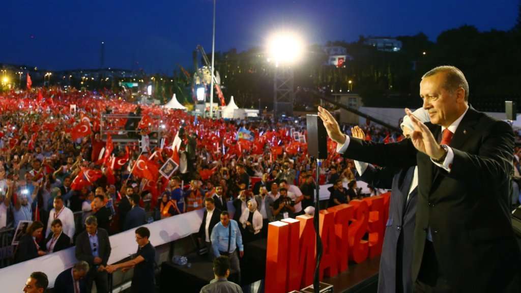 image for Erdogan threatens to 'chop off' traitors' heads in coup anniversary speech