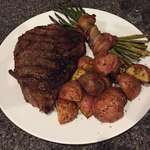 image for Buddy gave me a free grill, so I made him this; 16 oz Ribeye, Bacon Wrapped Grilled Asparagus, and Herb Roasted Red Potatoes [1334x750]