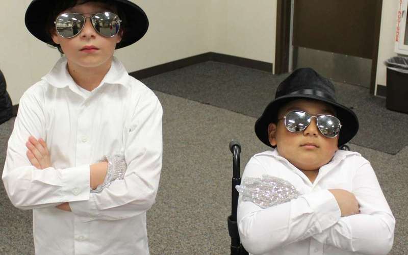 image for 8-year-old boy raises money to buy his bestie a new wheelchair