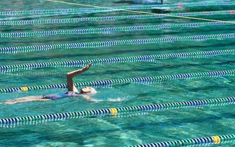 image for Woman, 92, breaks local records in her first swim meet