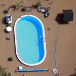 image for Swimming pool untouched by dirty flood waters