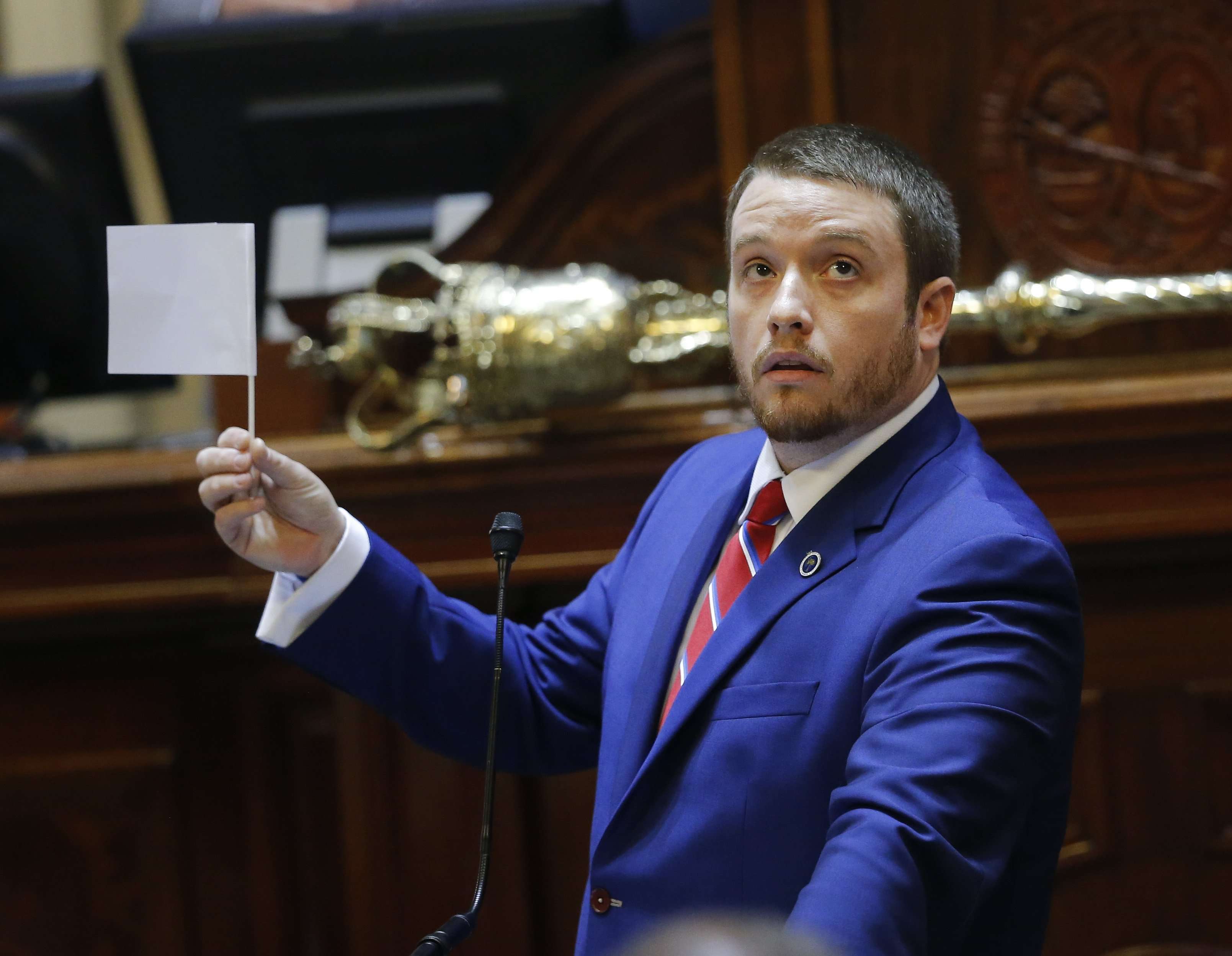 image for Chris Corley, ex-legislator known for Confederate flag stand, to plead guilty in attack on wife