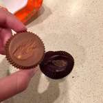 image for The way a Reese's peanut butter cup always tears some chocolate off on the bottom.