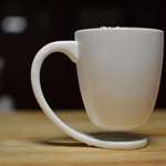 image for This floating mug - to eliminate coasters