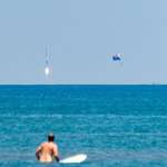 image for I photographed a surfer and parasailor watching Monday's Falcon 9 rocket landing.