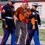 image for Roy Hawthorne, USMC. Former Navajo code talker. Roy walked the 2 mile parade route. With 1/2 mile left, he got tired and was assisted by two current Navajo marines