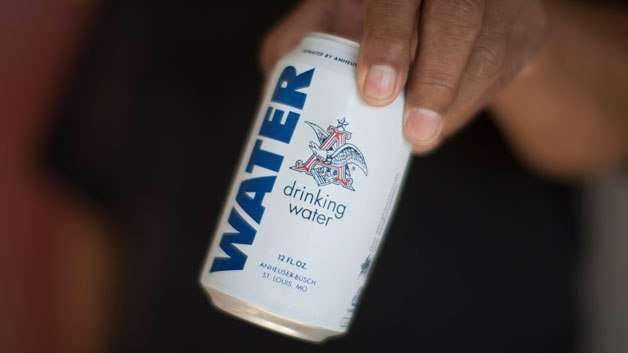 image for Anheuser-Busch Stops Canning Beer, Sending Canned Water To Harvey Victims