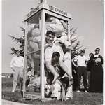 image for Seeing how many people you could pack into a phone booth was what teens did before the Internet, 1959.