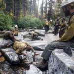 image for Firefighters taking a break out west