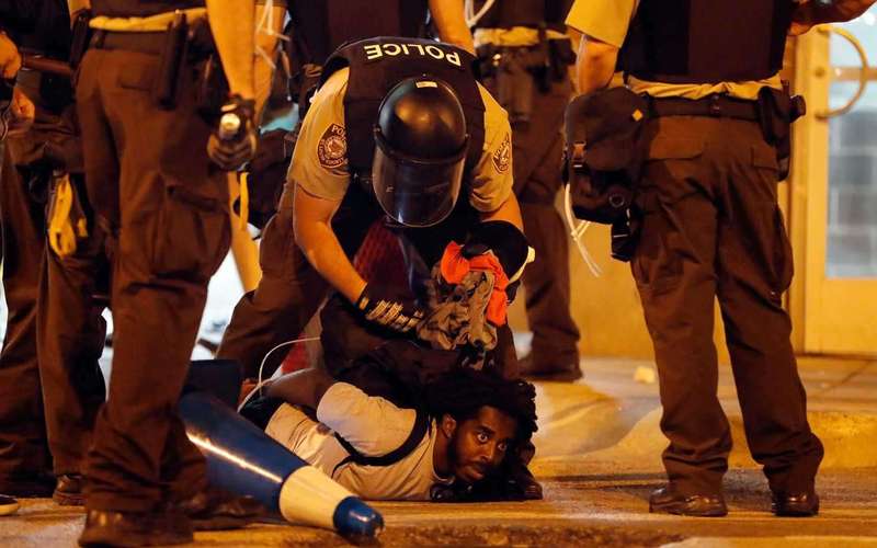 image for St. Louis officers chant ‘whose streets, our streets’ while arresting protesters