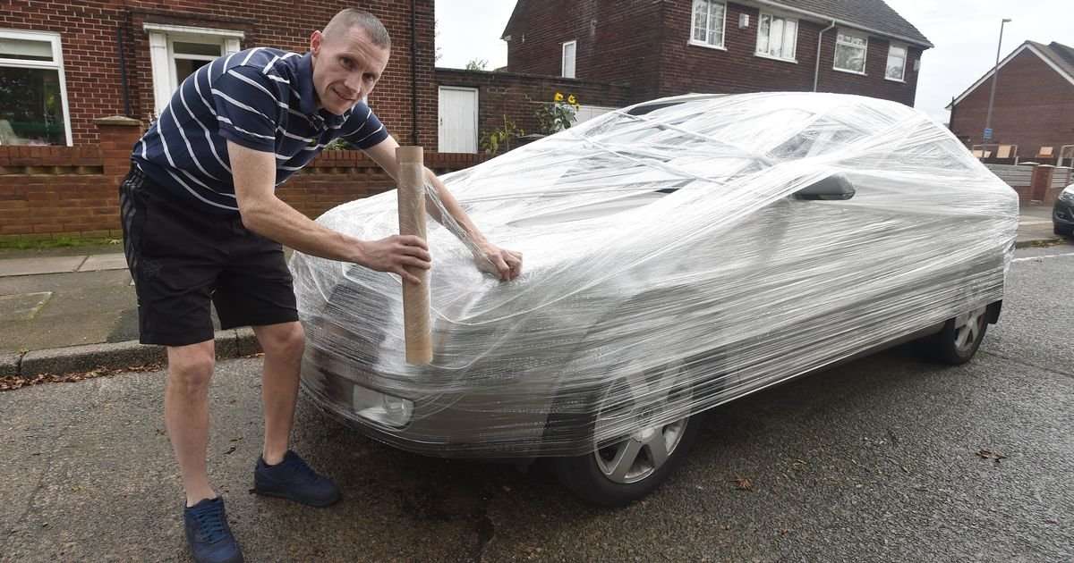 image for Man cling-filmed car because he's sick of people parking outside his house and going on holiday