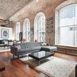 image for Brick barrel vaulted ceiling and 12-foot windows in this Philadelphia industrial loft [2038 x 1366]