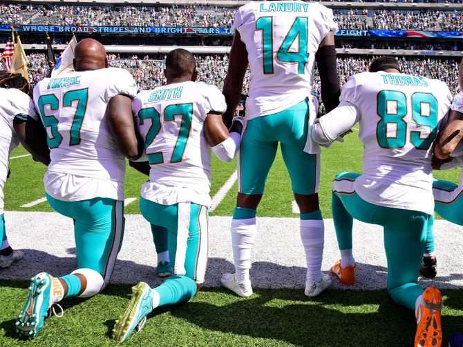 image for Russian-linked Twitter accounts stoked NFL anthem debate