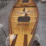 image for Helped some high school kids build a canoe. 16ft Cypress and Walnut.