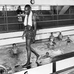 image for David Isom, 19, broke the color line in a segregated pool in Florida on June 8, 1958, which resulted in officials closing the facility. [1200 x 1169]