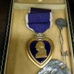 image for A nice couple found my great grandpa's purple heart in a forclosed home in a box labled "trash" and returned it to my family.