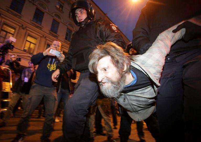 image for On Putin's birthday, opposition activists protest, call for him to quit