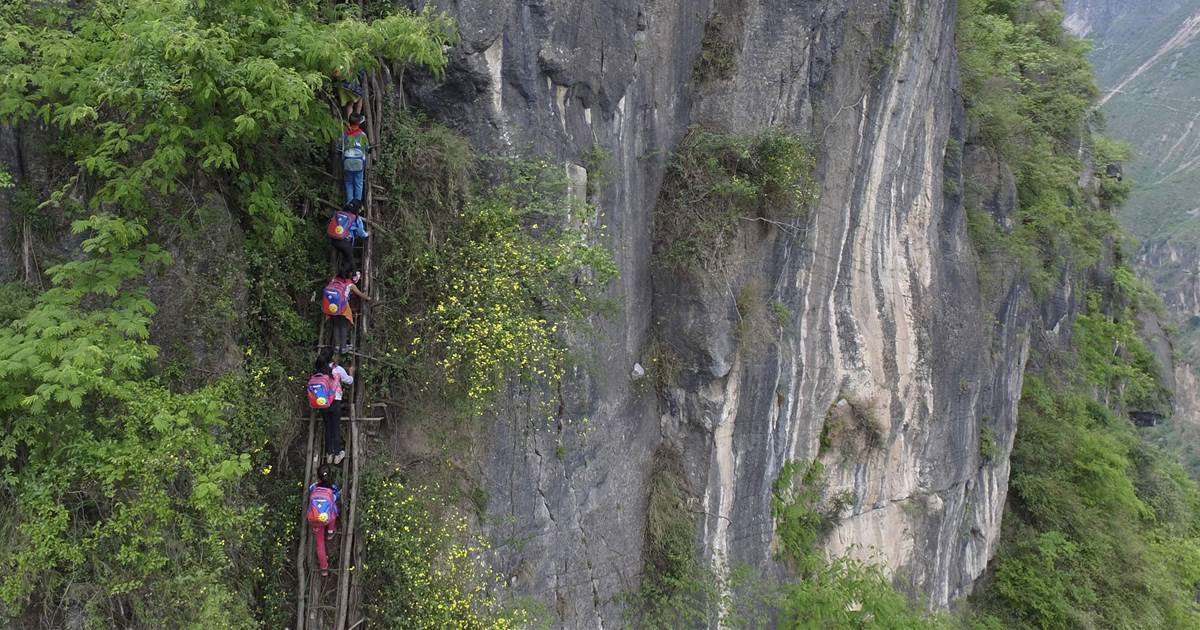 image for Chinese Students Climb 2,500-Foot Bamboo Ladder to Get Home From School