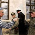 image for Russian inmate points an identifying and accusing finger at a Nazi guard who was especially cruel towards the prisoners in Buchenwald camp. Colorized. [1024x785]