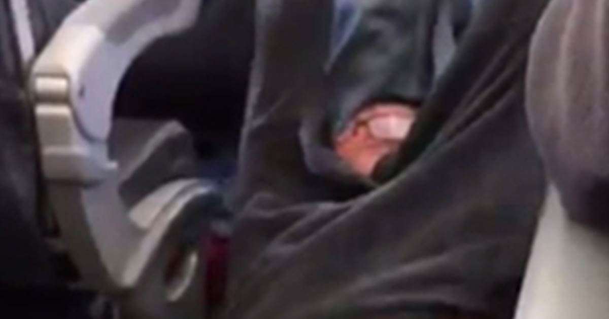 image for Two Officers Are Fired for Dragging Doctor Off a United Flight