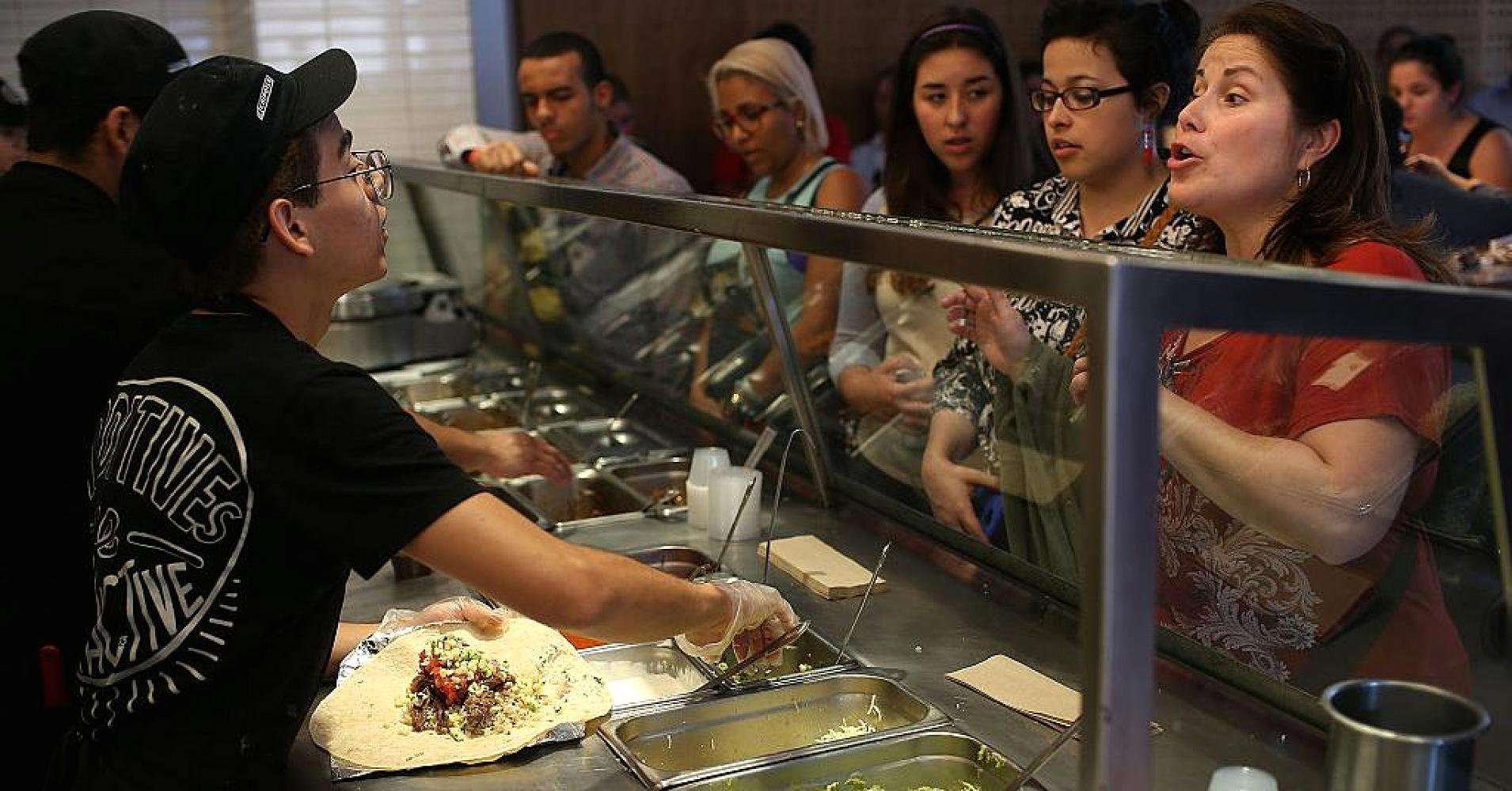 image for Chipotle downgraded by Bank of America on new concern: It's paying employees too much
