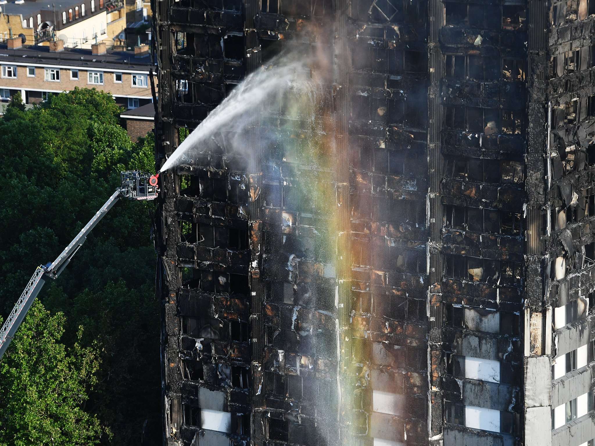 image for Theresa May says no Government cash for sprinklers in tower blocks despite promises made after Grenfell