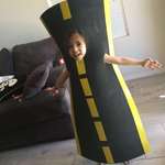 image for My little cousin wanted to be a road for Halloween, so my aunt made her this costume