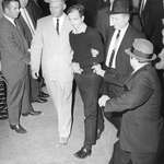 image for The other, less famous photo, of Jack Ruby shooting Lee Harvey Oswald [ 1300 x 1000 ]