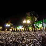 image for Cotton picker at night looks like a huge concert crowd