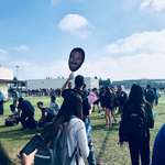 image for My teacher raises a picture of his own face to make sure no student is lost during the fire drill.